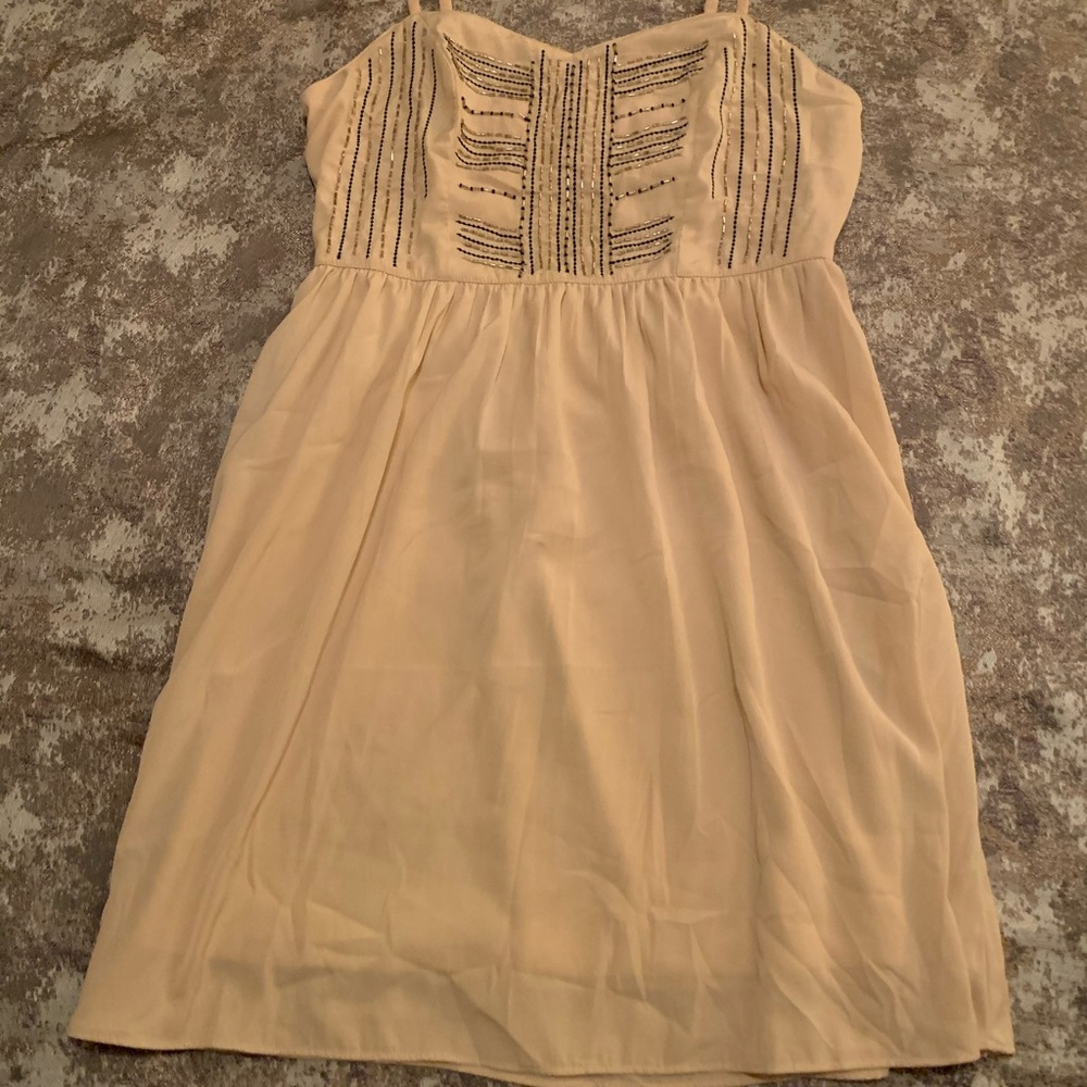 Beaded cocktail dress in light pink by AE